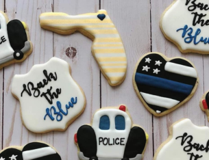 Cookies designed with a police and Florida theme.