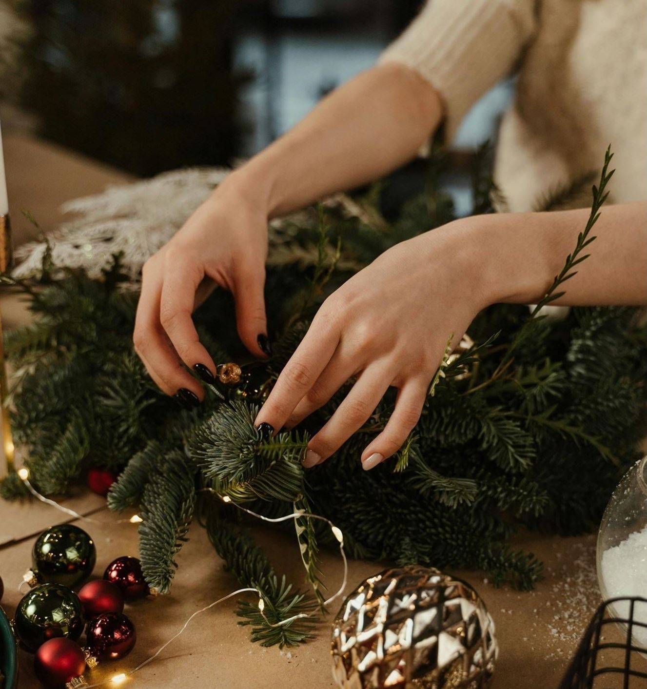 Decorating a holiday wreath