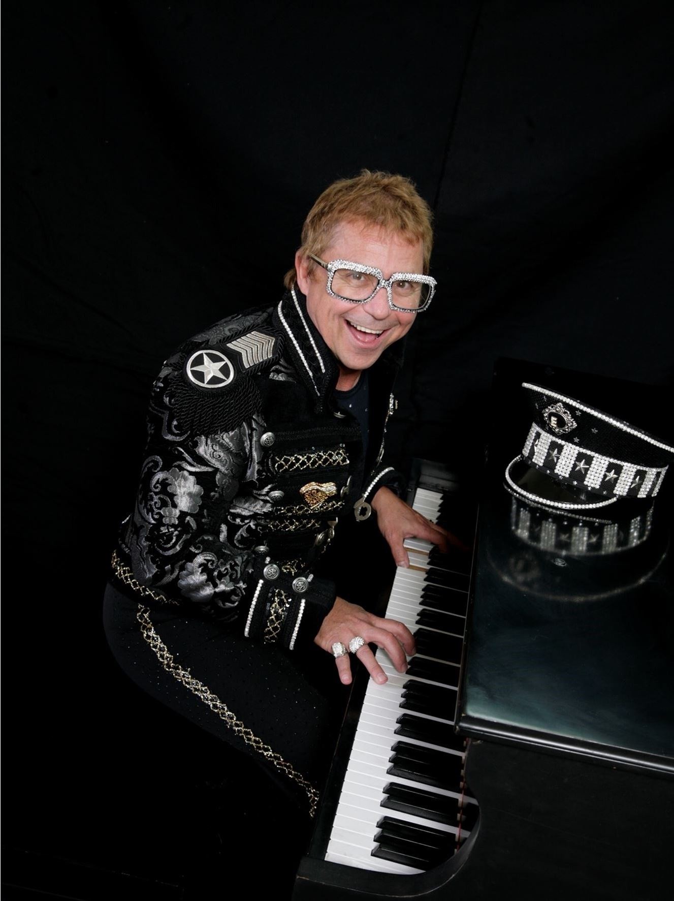 Photo: Craig A. Meyer performing as Elton John in Remember When Rock was Young tribute show
