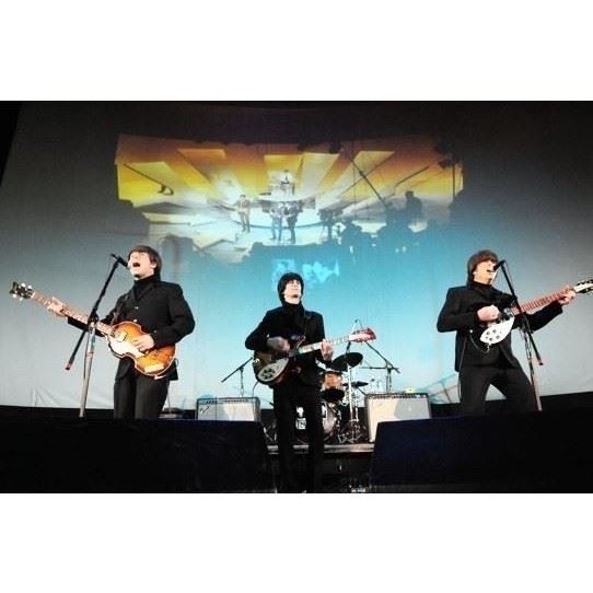 Photo: band members of Yesterday: Beatles Tribute band