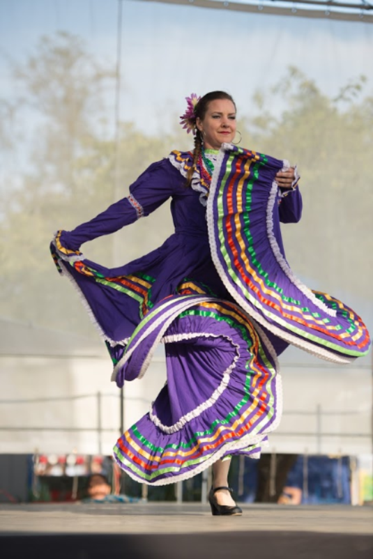 Woman in Mexican dancer costume