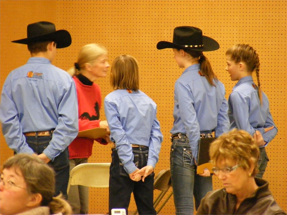 Campbell Co. team from Wyoming giving their oral part of the Jr. Hippology team problem