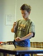 4-H child working on a Rocketry Project