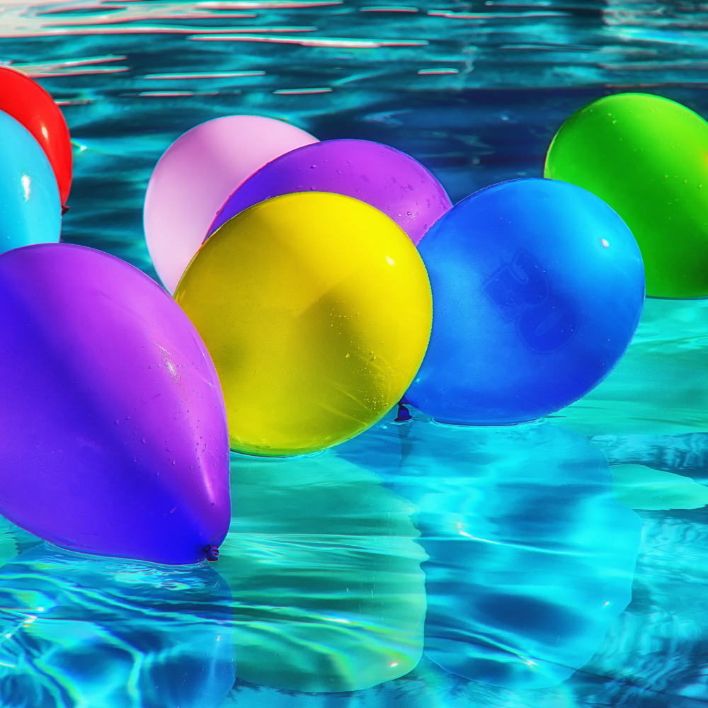 Image of balloons floating in pool