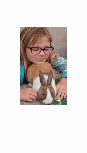 Young 4-H member & her bunny - photo from Heather Wroe (2021)