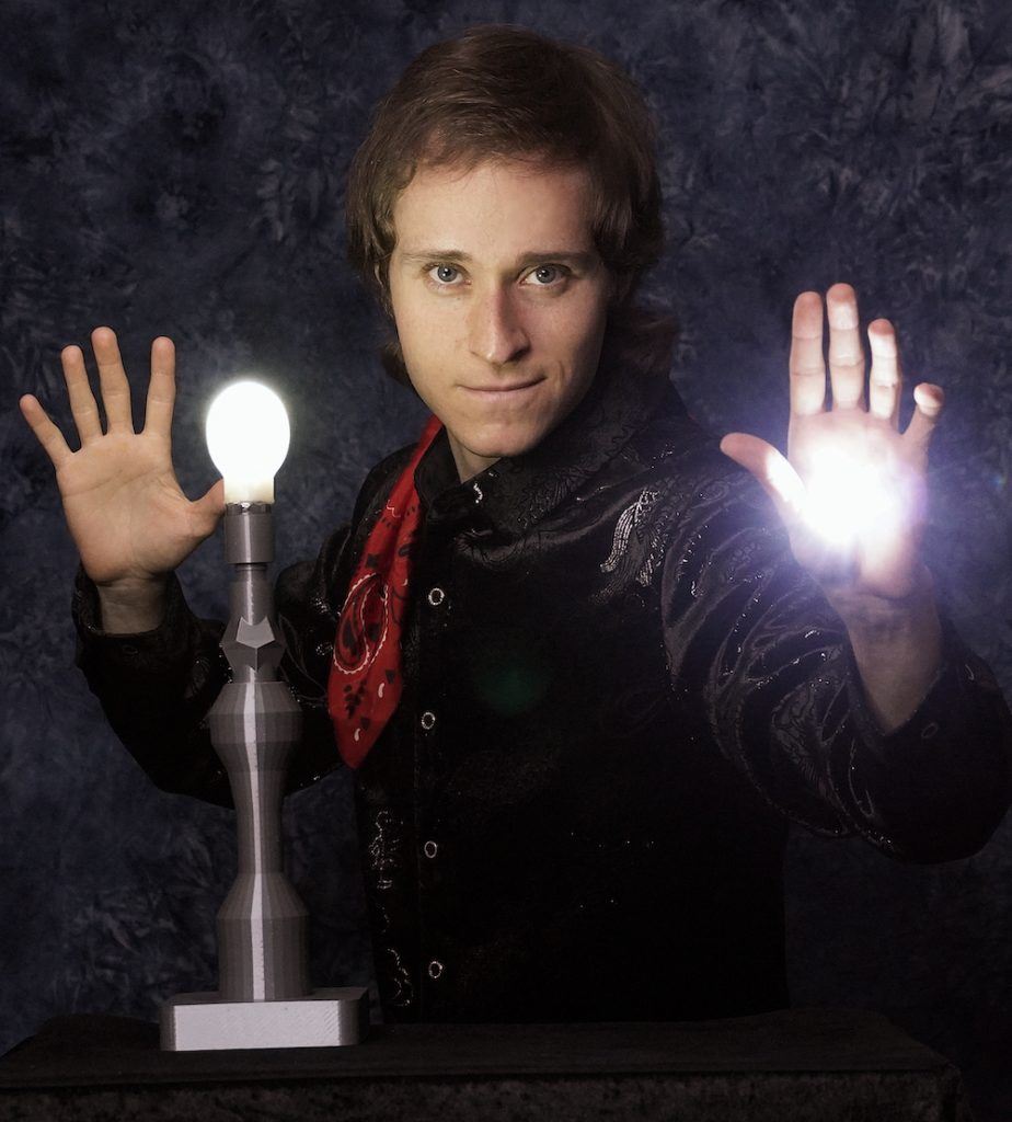 photo of man and lightbulb to look like magic
