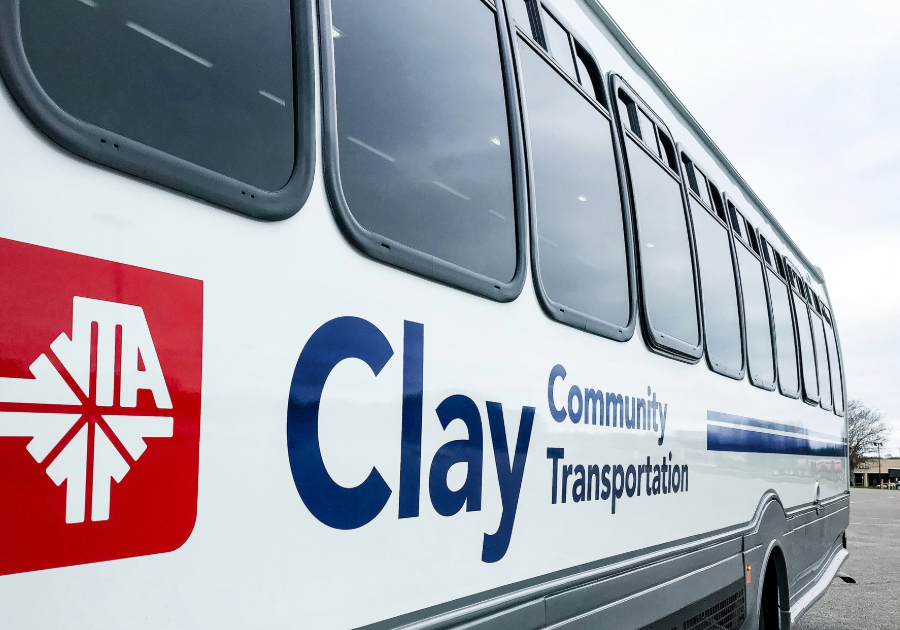 Side view of Clay Transit bus