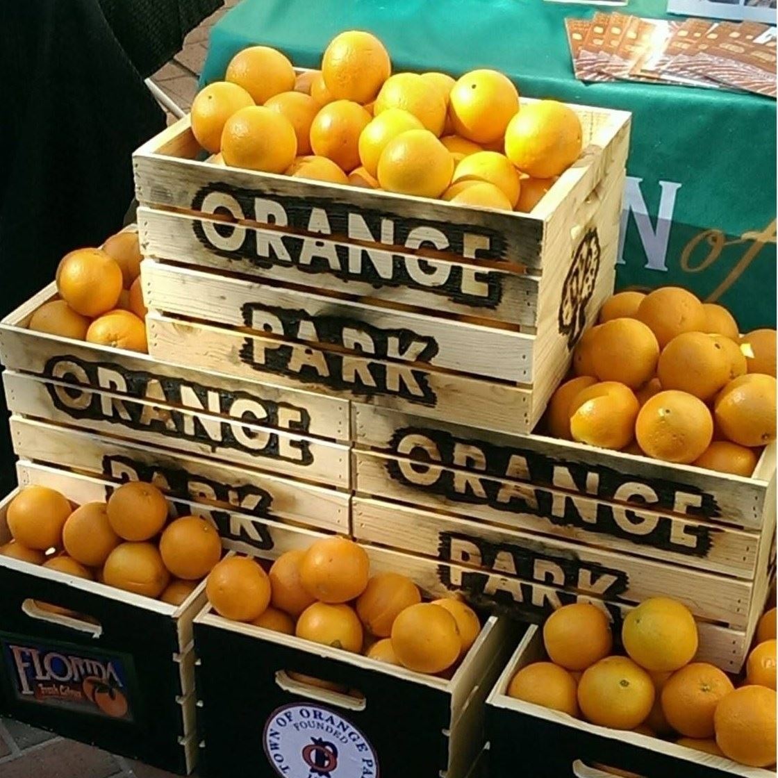6 crates full of oranges