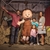 Family with pig pen at Knott's Berry Farm in Buena Park, CA
