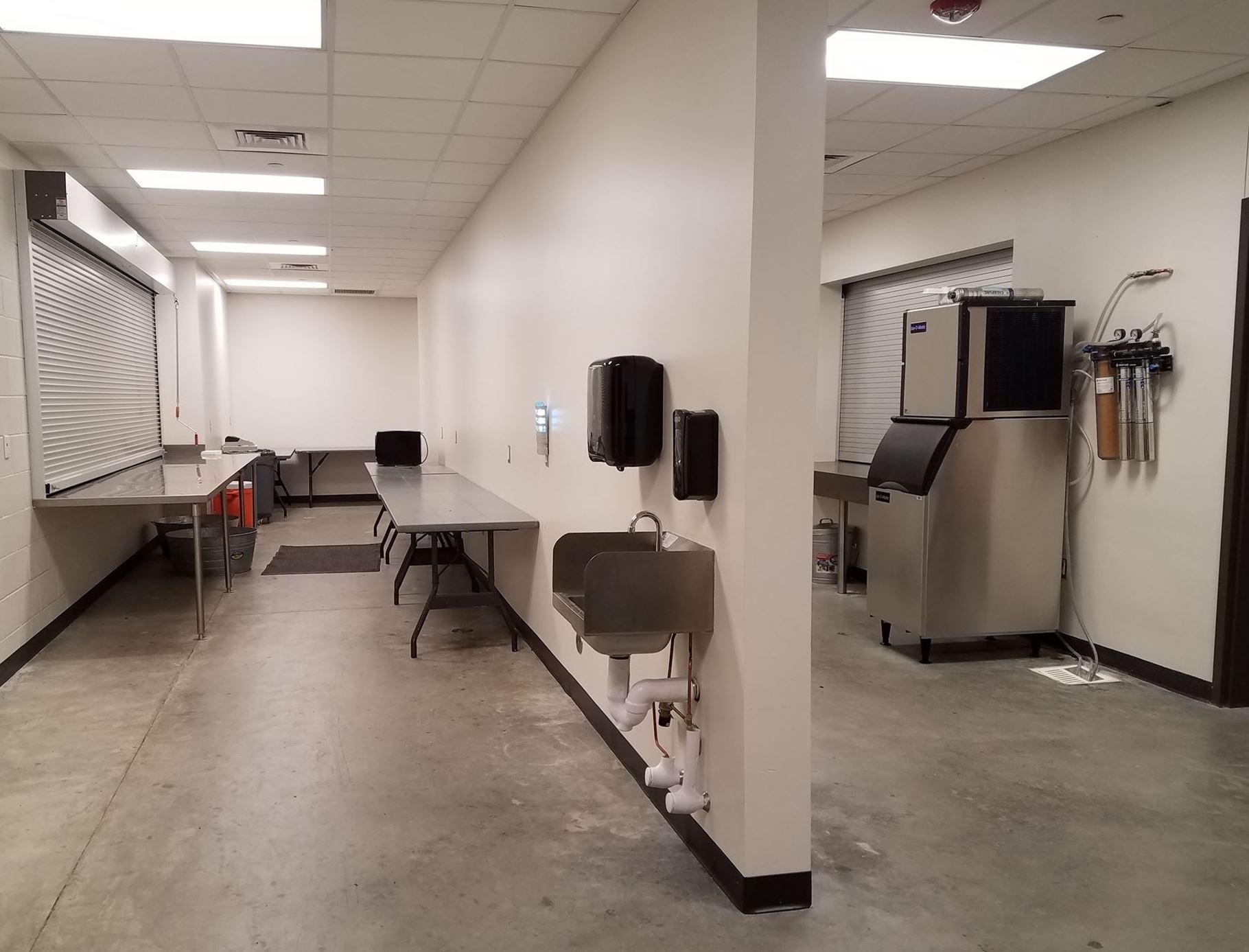 Indoor Catering Kitchen with ice machines and tables